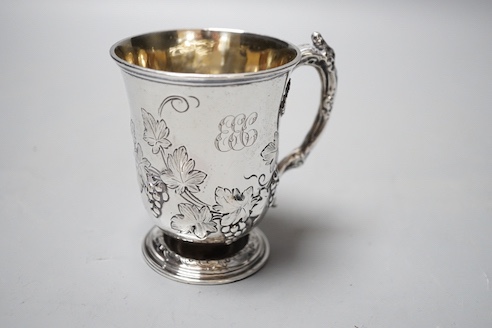 A Victorian embossed silver christening mug, Edward & John Barnard, London, 1856, 9cm, 149 grams.